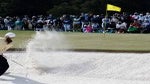 Emilia Migliaccio plays a shot out of the bunker during the playoff.